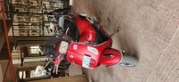Matt Red Vespa SXL 150