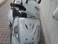White Suzuki Access 125