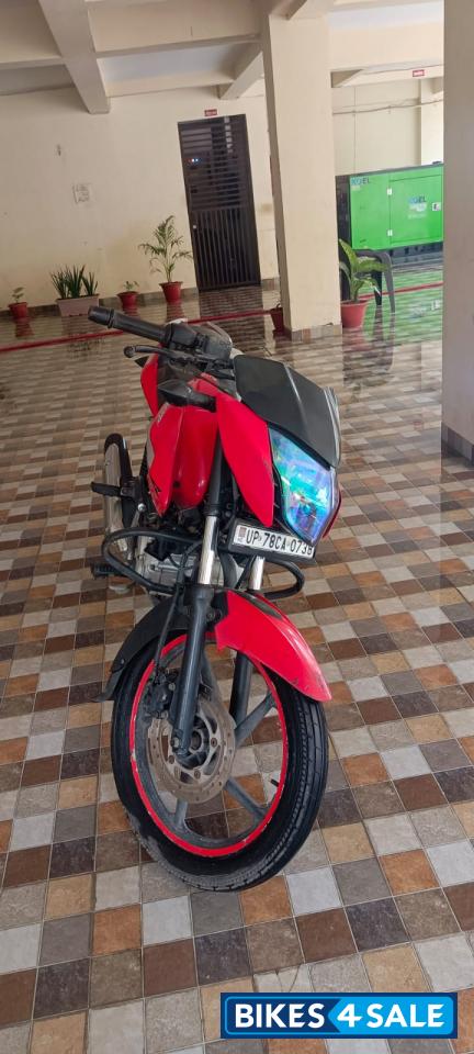Red Bajaj Pulsar 135LS