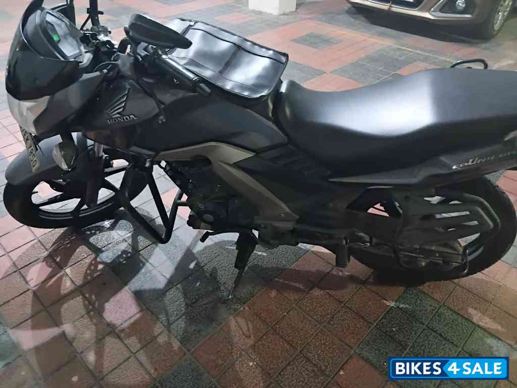 Grey Honda Unicorn Sporty
