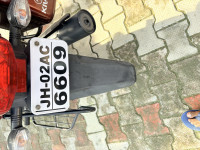 Maroon Honda Shine 125