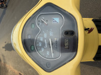Yellow Vespa ZX 125