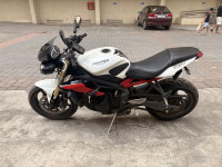 White And Red Triumph Street Triple 675