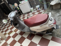 White Suzuki Access 125