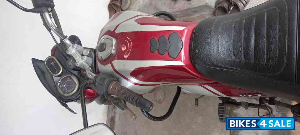 Maroon Bajaj V12
