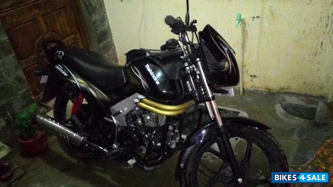 Black And Gold Mahindra Centuro