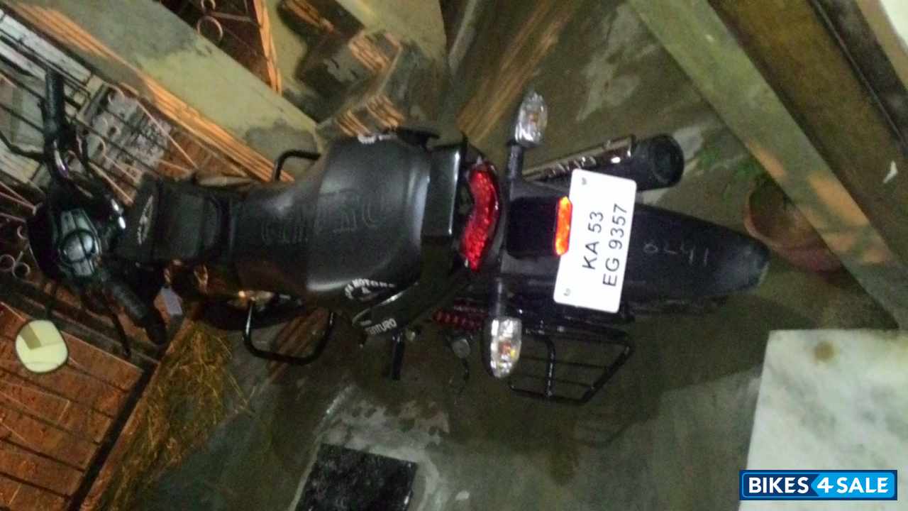 Black And Gold Mahindra Centuro