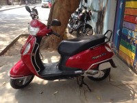 Red Suzuki Access 125