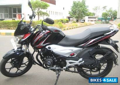 Red/black Bajaj Discover 125 ST