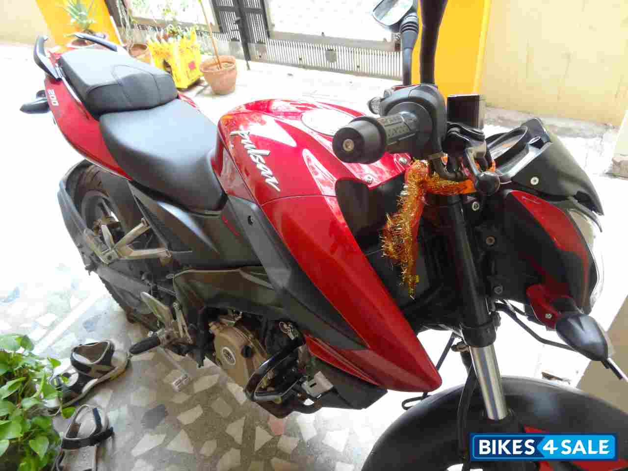 Black-red Bajaj Pulsar 200 NS