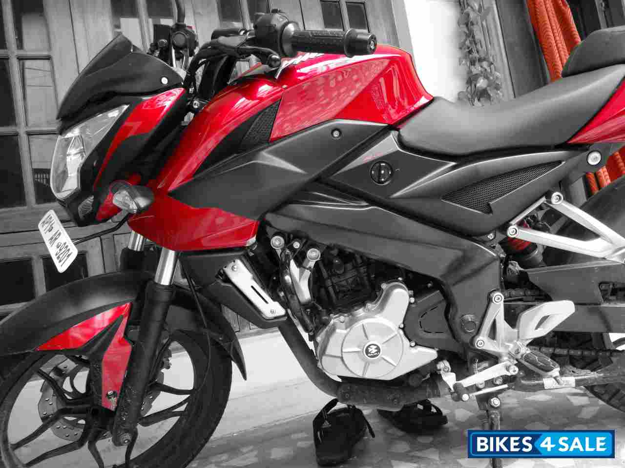 Black-red Bajaj Pulsar 200 NS
