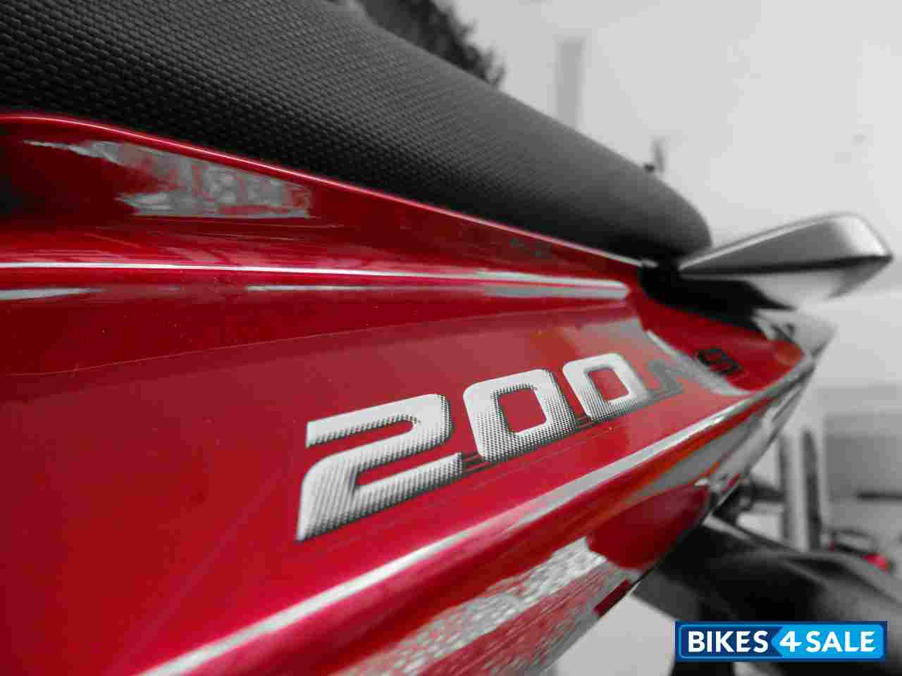 Black-red Bajaj Pulsar 200 NS