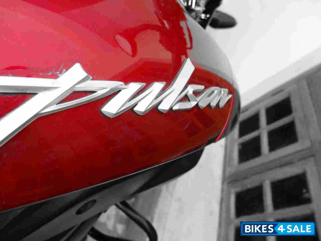 Black-red Bajaj Pulsar 200 NS