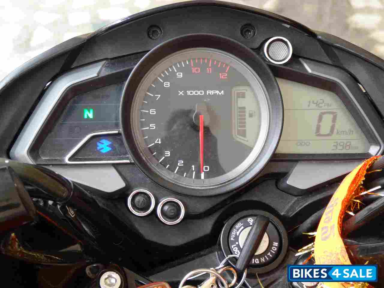 Black-red Bajaj Pulsar 200 NS