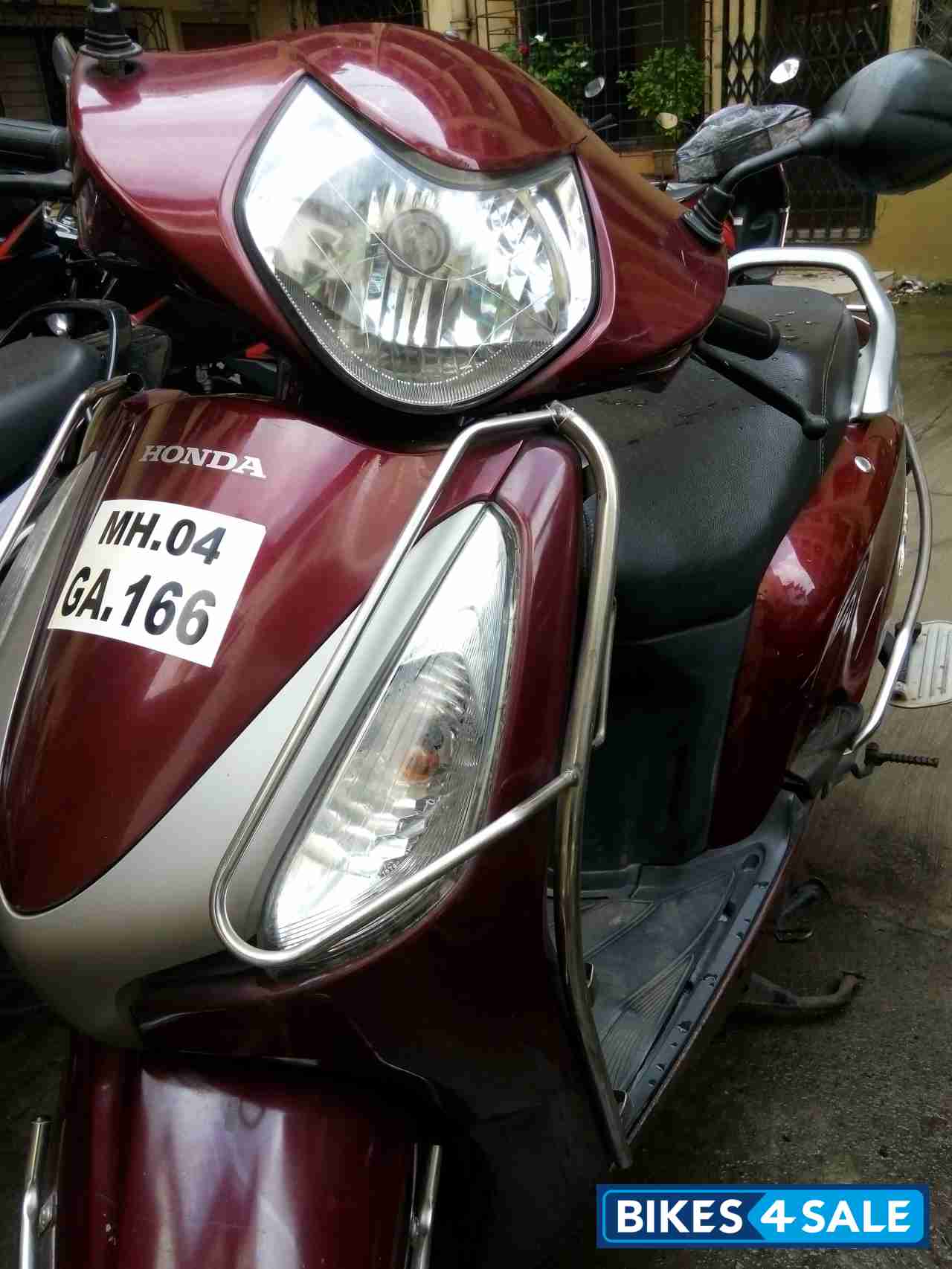 Maroon Honda Aviator