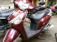 Maroon Honda Aviator