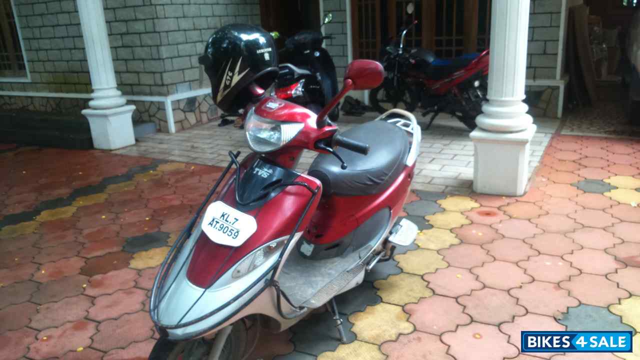Red And White TVS Scooty Pep