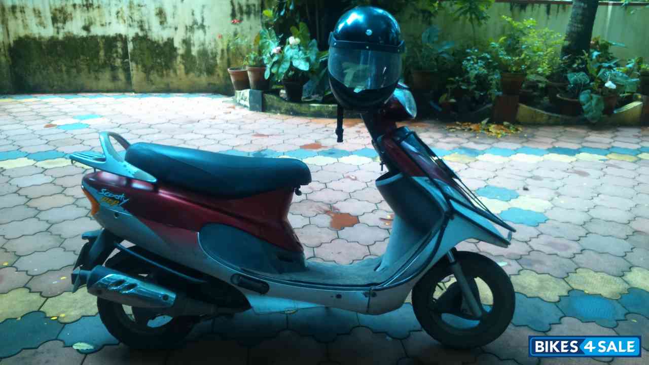Red And White TVS Scooty Pep