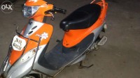 Orange TVS Scooty Pep Plus