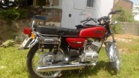 Red Yamaha RX 100
