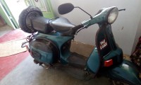 Green Bajaj Classic
