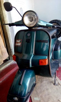 Green Bajaj Classic