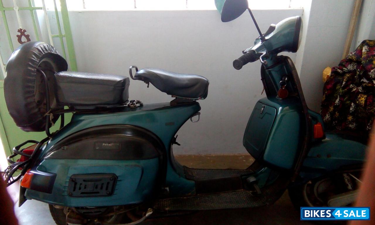 Green Bajaj Classic