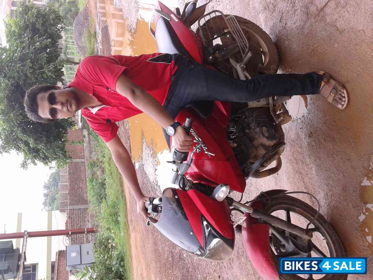 Red Bajaj Pulsar 150 DTSi