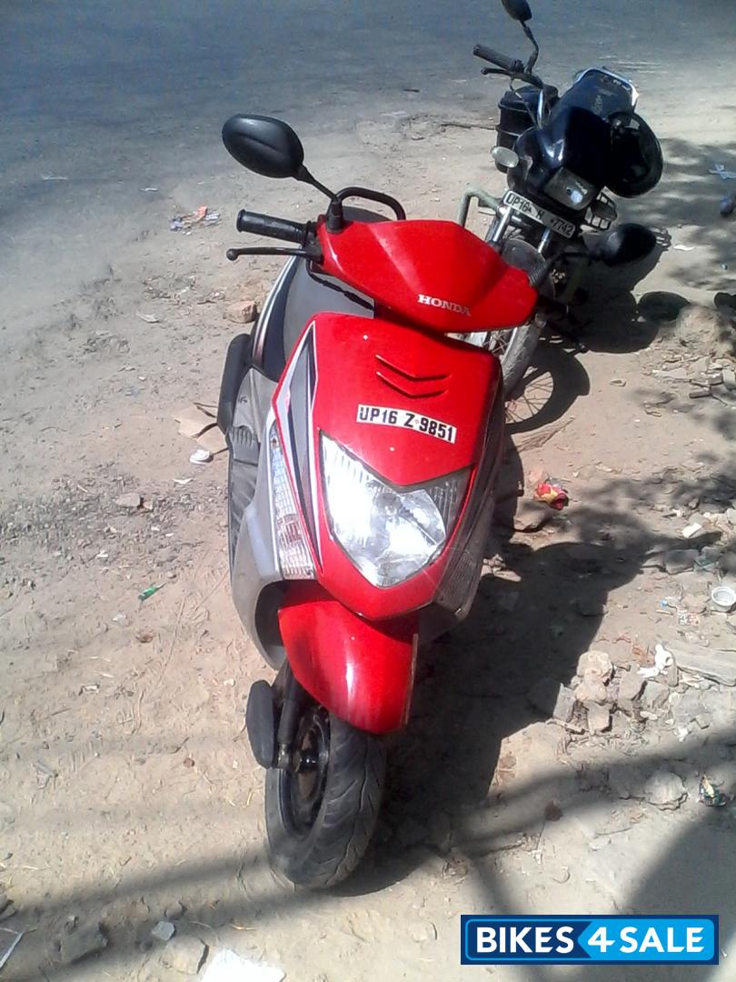 Used 2012 model Honda Dio for sale in Noida. ID 124391. Red And Black
