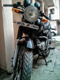 Black Bajaj Pulsar 150 Round Headlight