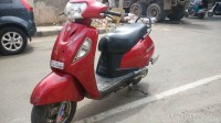 Red Suzuki Access 125