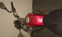 Red Bajaj Caliber 115