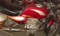Red Bajaj Caliber 115