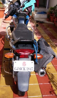 Black/blue Bajaj Discover 125