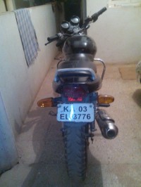 Black Bajaj Pulsar 150 Round Headlight