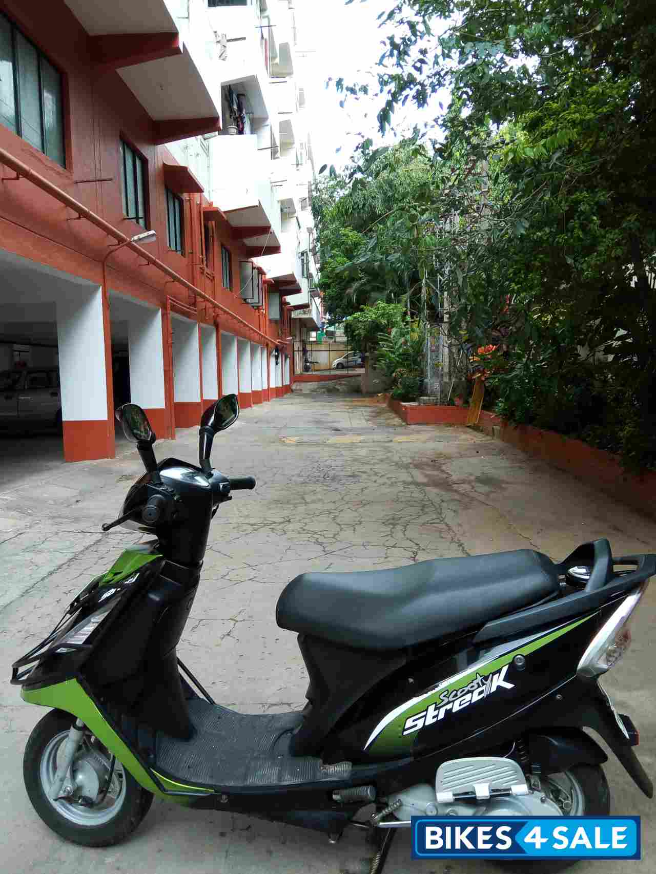 Green TVS Scooty Streak