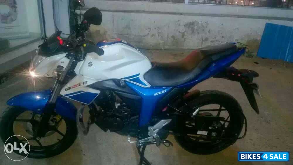 White And Blue Suzuki Gixxer 150