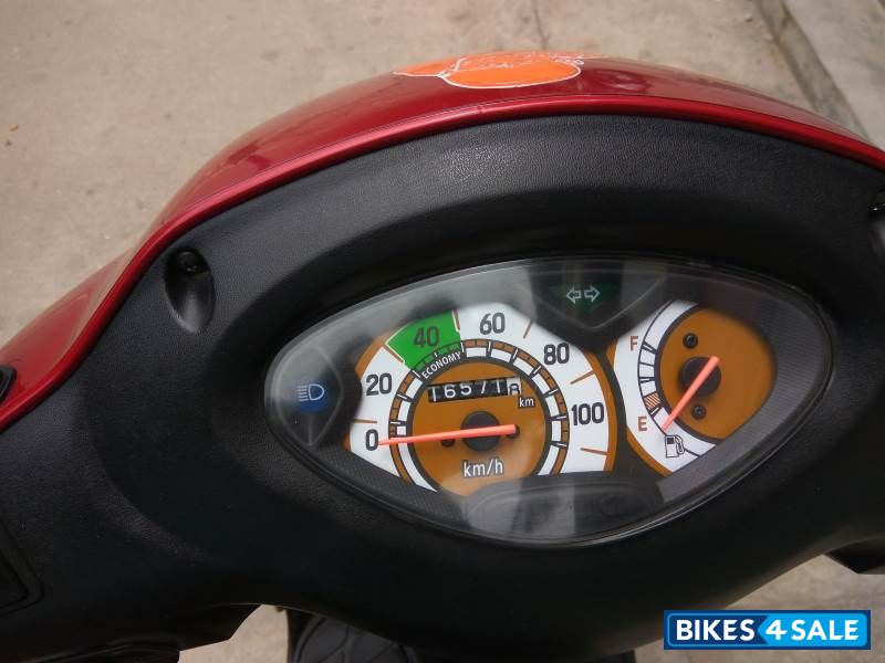 Red Suzuki Access 125