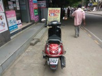 Red Suzuki Access 125