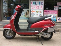 Red Suzuki Access 125