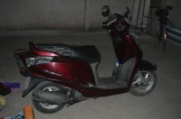 Maroon Honda Aviator