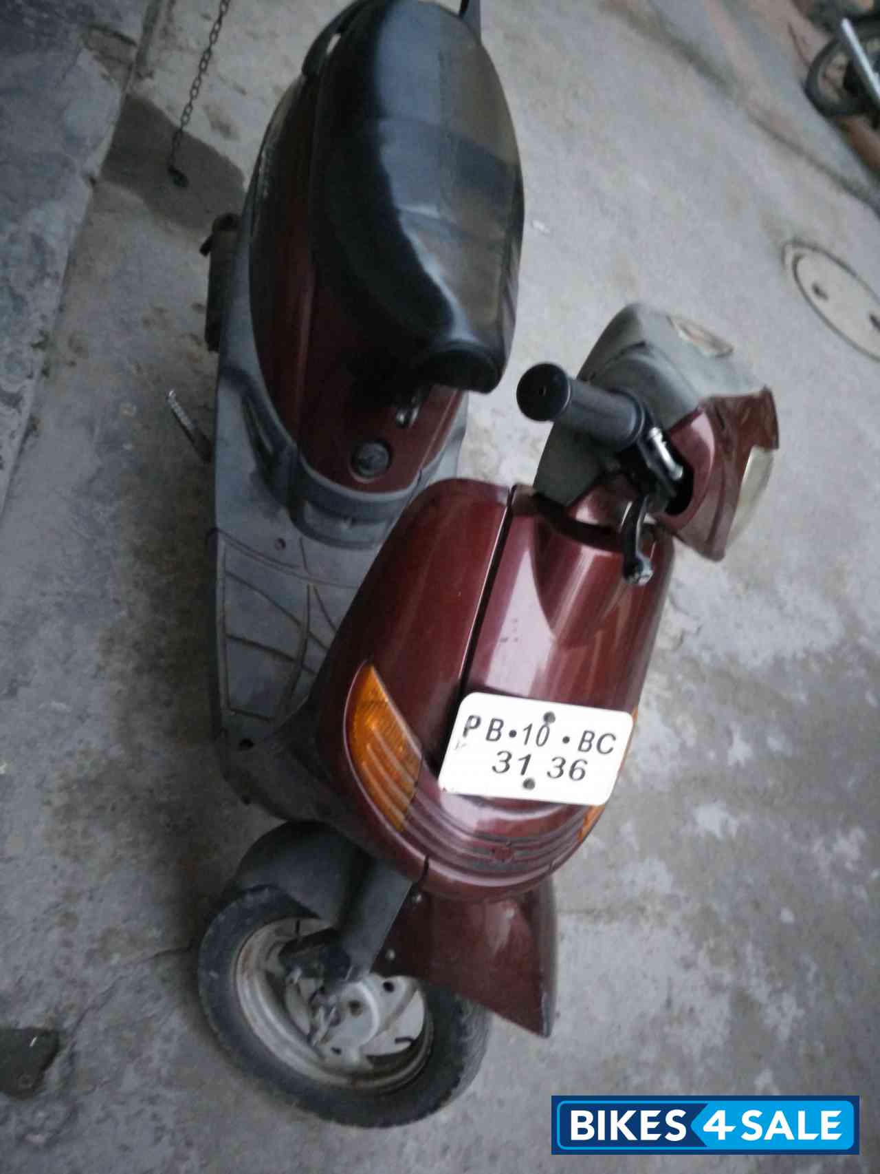 Maroon Bajaj Spirit