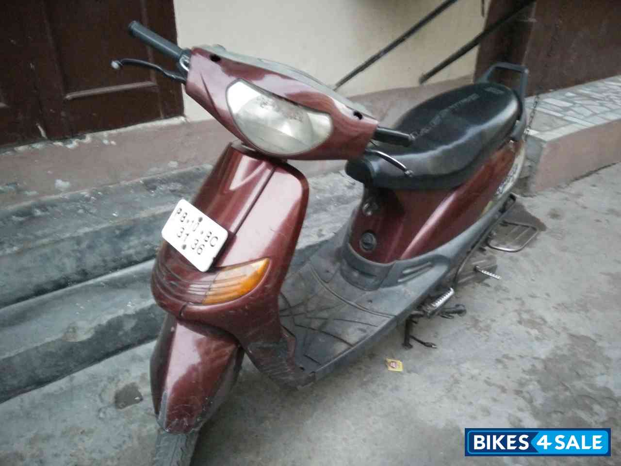 Maroon Bajaj Spirit Maroon Bajaj Spirit