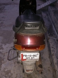 Maroon Bajaj Spirit