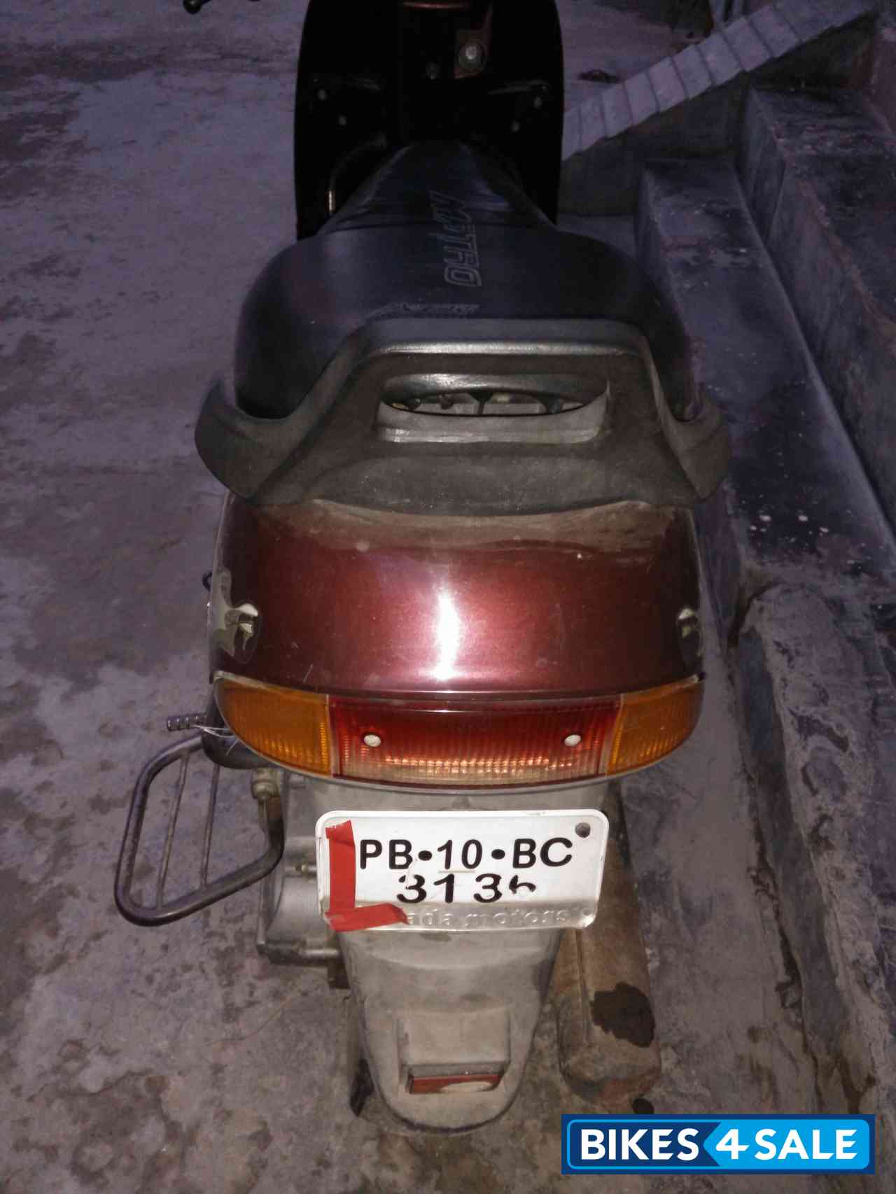 Maroon Bajaj Spirit Maroon Bajaj Spirit