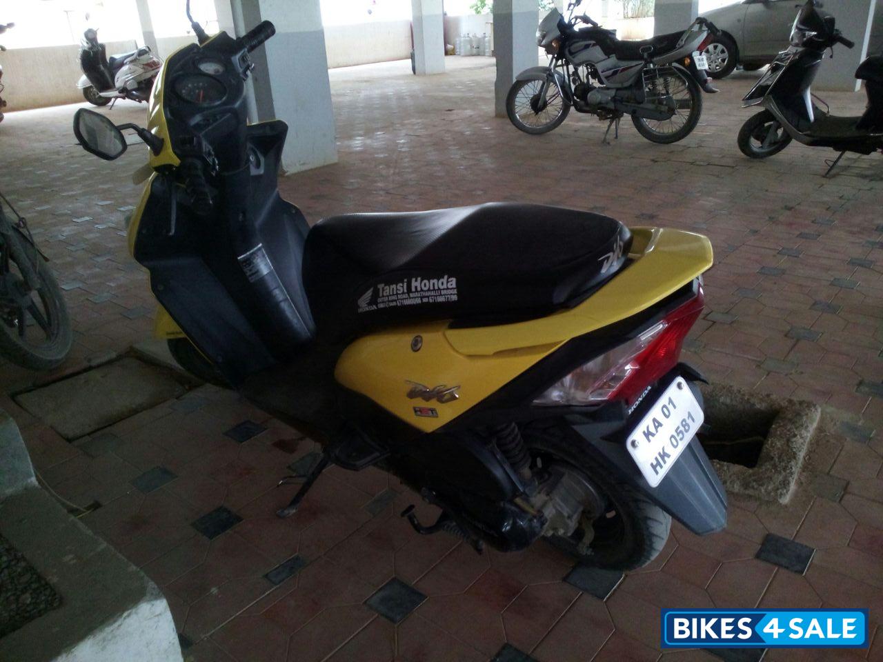 Used 2015 model Honda Dio for sale in Bangalore. ID 140007. Yellow
