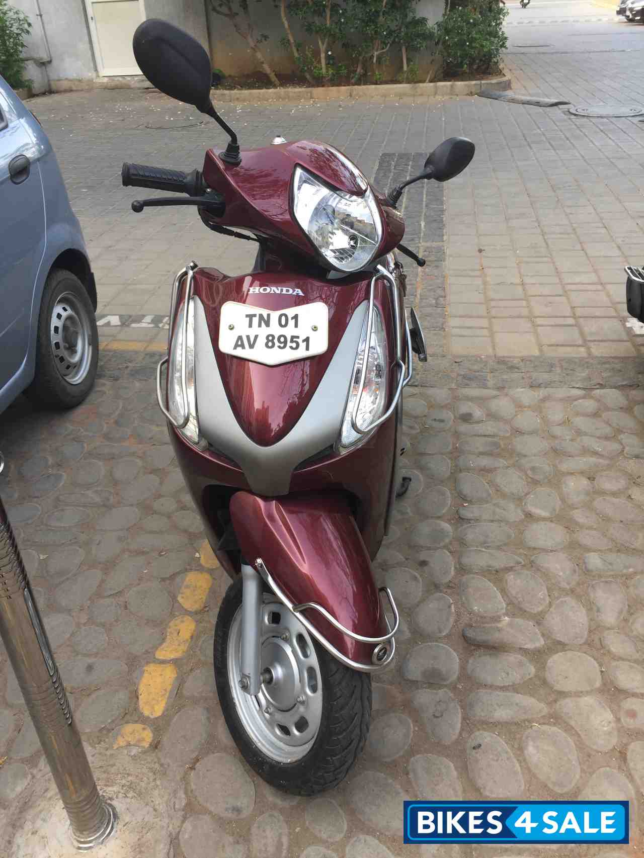 Maroon Honda Aviator