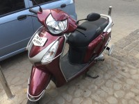 Maroon Honda Aviator