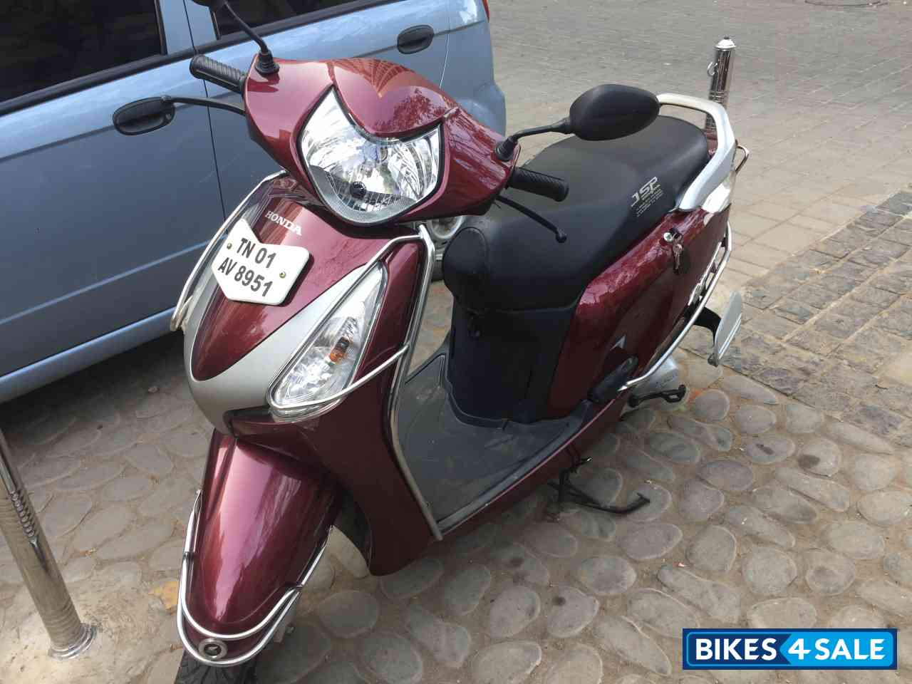 Maroon Honda Aviator