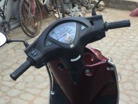 Maroon Honda Aviator